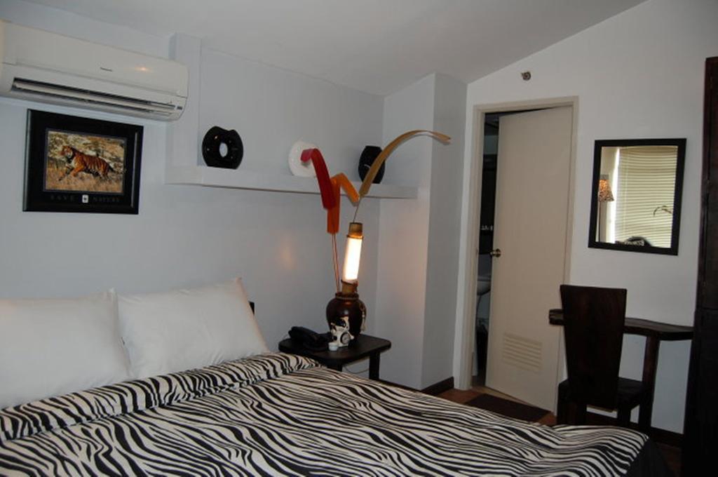 Azotea Suites Manila Habitación foto
